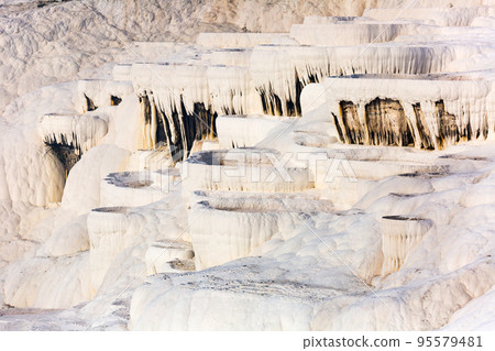 Travertines mountains of Pamukkale in Turkey. Travertines mountains of Pamukkale in Turkey. 95579481