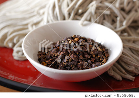 Buckwheat seeds with shell Buckwheat seeds with shell 95580685