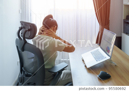 Woman having Neck and Shoulder pain during work long time on workplace. due to fibromyalgia, rheumatism, Scapular pain, office syndrome and ergonomic concept Woman having Neck and Shoulder pain during work long time on workplace. due to fibromyalgia, rheumatism, Scapular pain, office syndrome and ergonomic concept 95580692