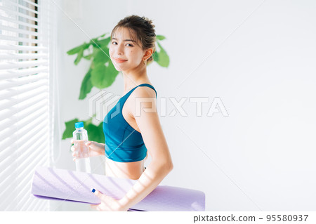 A young woman training A young woman training 95580937