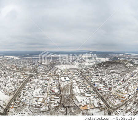 City panorama from the height of the drone flight. Residential area of brick houses in the winter. Aerial view. Nizhny Tagil, Russia City panorama from the height of the drone flight. Residential area of brick houses in the winter. Aerial view. Nizhny Tagil, Russia 95583139