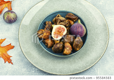 Candied dried and fresh figs. 95584383