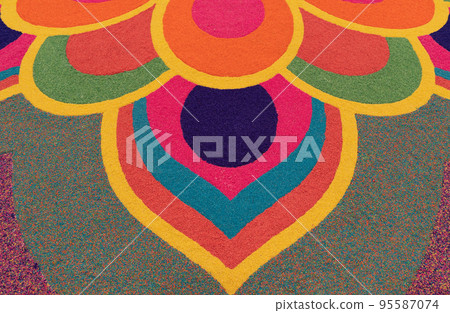 Close-up view of the beautiful colorful Indian traditional rangoli decoration for Diwali or Deepavali celebration Close-up view of the beautiful colorful Indian traditional rangoli decoration for Diwali or Deepavali celebration 95587074