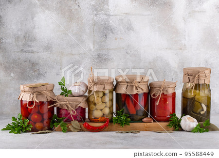 Pickled vegetables in glass jars. Pickled vegetables in glass jars. 95588449