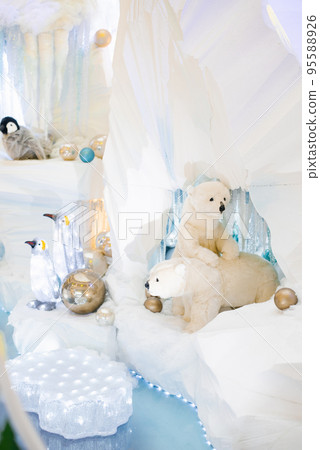 Christmas decor. Polar polar bears on an artificial iceberg in a cave 95588926