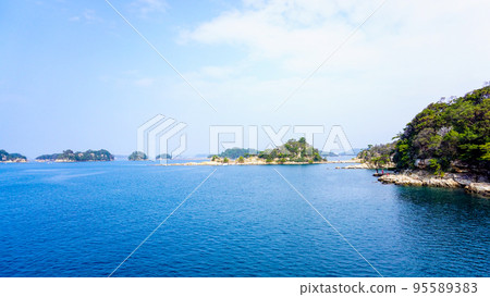 The islands of Kujukushima seen from a pleasure boat The islands of Kujukushima seen from a pleasure boat 95589383