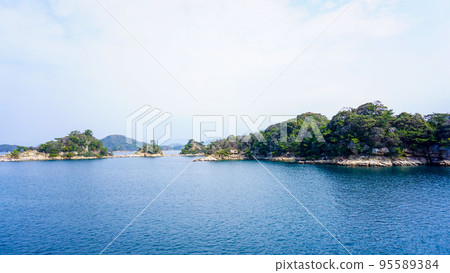 The islands of Kujukushima seen from a pleasure boat The islands of Kujukushima seen from a pleasure boat 95589384