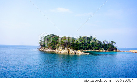 The islands of Kujukushima seen from a pleasure boat The islands of Kujukushima seen from a pleasure boat 95589394