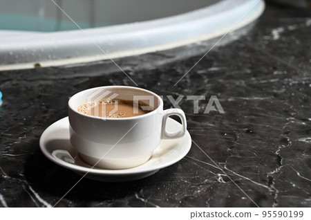 Hot coffee, coffee, coffee, mug on marble table Hot coffee, coffee, coffee, mug on marble table 95590199