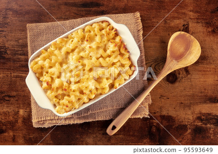 Macaroni and cheese pasta in a casserole, shot from above Macaroni and cheese pasta in a casserole, shot from above 95593649