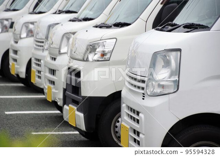 Business image Light vans lined up in the parking lot Business image Light vans lined up in the parking lot 95594328