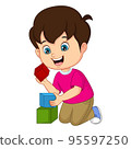 Cute little boy playing with building blocks 95597250