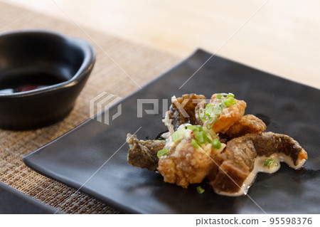 Close up of Crispy Fish Skin 95598376