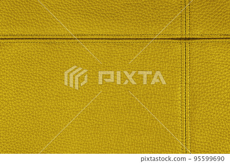 Yellow golden leather, leatherette texture background wtih decorative stich Yellow golden leather, leatherette texture background wtih decorative stich 95599690