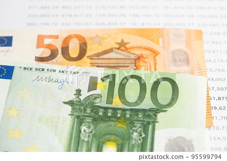 Euro banknotes on spreadsheet paper, Banking Account, Investment Analytic research data economy, trading, Business company concept. Euro banknotes on spreadsheet paper, Banking Account, Investment Analytic research data economy, trading, Business company concept. 95599794