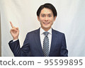Businessman guts pose smile 95599895