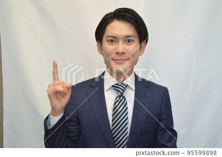 Businessman guts pose smile Businessman guts pose smile 95599898