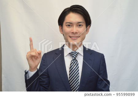 Businessman guts pose smile Businessman guts pose smile 95599899