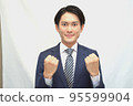 Businessman guts pose smile 95599904