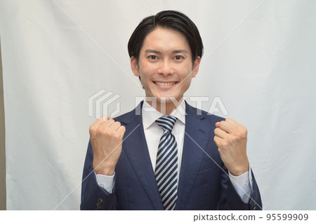 Businessman guts pose smile 95599909