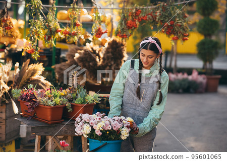 Selling flowers places flowers in a bucket for sale 95601065