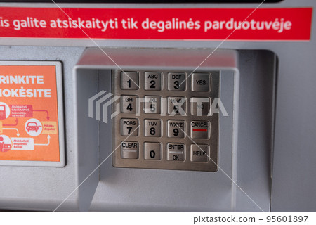 LITHUANIA - AUGUST 01, 2021: Pin keypad on an atm or gas station 95601897