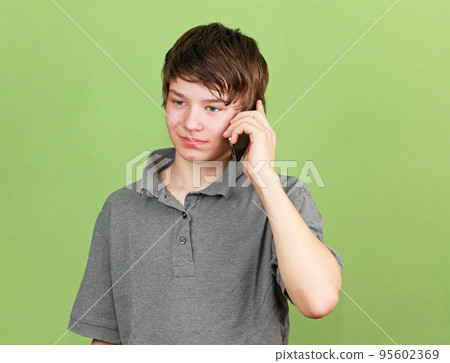 Boy with phone 95602369