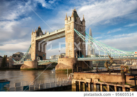 Historic Bridge over River Thames and Cityscape Skyline during dramatic sunrise. Tower Bridge Historic Bridge over River Thames and Cityscape Skyline during dramatic sunrise. Tower Bridge 95603514