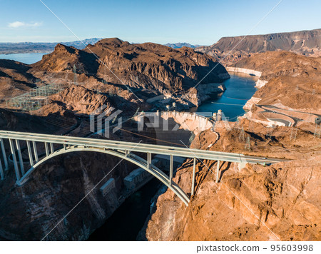 Aerial view of the Hoover Dam in United States. Hydroelectric power station on the border of Arizona and Nevada. 95603998
