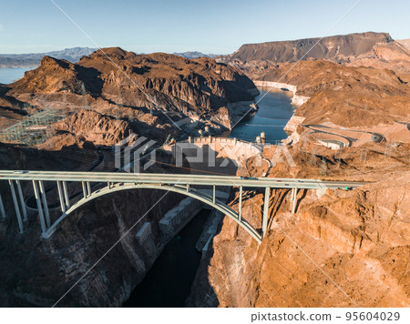 Aerial view of the Hoover Dam in United States. Aerial view of Hoover Dam and the Colorado River Bridge Aerial view of the Hoover Dam in United States. Aerial view of Hoover Dam and the Colorado River Bridge 95604029