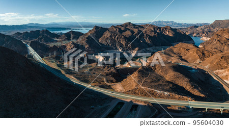 Aerial view of the Hoover Dam in United States. Aerial view of Hoover Dam and the Colorado River Bridge Aerial view of the Hoover Dam in United States. Aerial view of Hoover Dam and the Colorado River Bridge 95604030