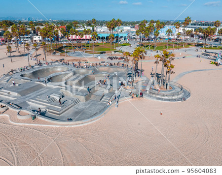 Aerial view of the skatepark of the Venice Beach in LA, California. This skatepark, with pool, ramps, stair set and flow bowls Aerial view of the skatepark of the Venice Beach in LA, California. This skatepark, with pool, ramps, stair set and flow bowls 95604083