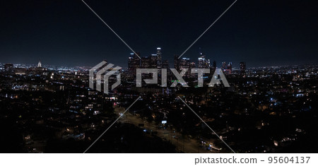 View of Downtown Los Angeles from the Hollywood Hills. Interstate 101 is shown in the foreground. 95604137