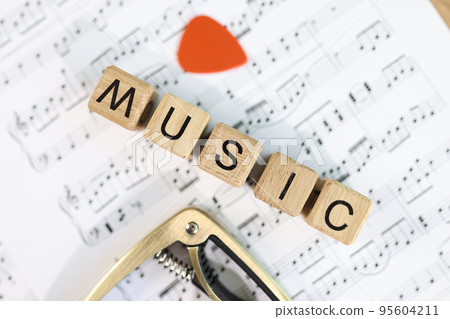 Wooden cubes with music word on notes Wooden cubes with music word on notes 95604211