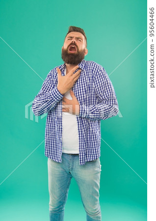 inspired caucasian guy with beard and mustache singing song on blue background, vocal 95604466