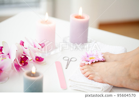 Female Feet at Spa Salon on Pedicure Procedure. Female Feet at Spa Salon on Pedicure Procedure. 95604570