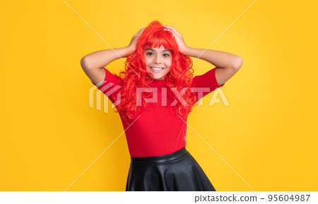happy kid with red long hair on yellow background happy kid with red long hair on yellow background 95604987