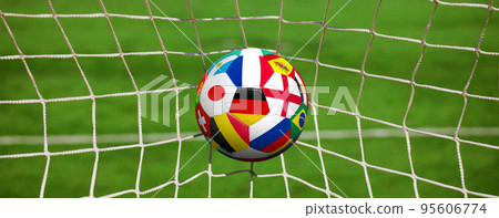 Soccer ball in the net of a goal. Soccer concept 95606774