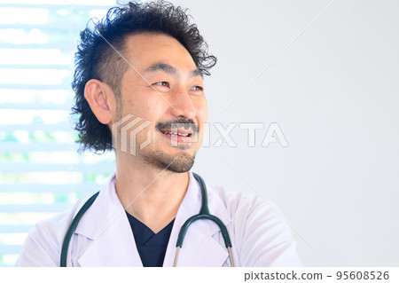 Close-up image of a veteran doctor in a white coat with copy space on the right Close-up image of a veteran doctor in a white coat with copy space on the right 95608526