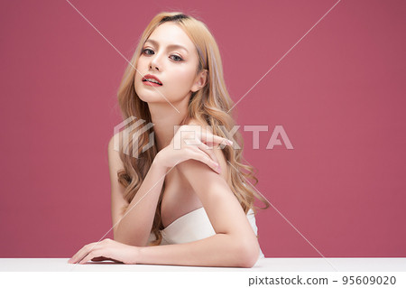 Beautiful young asian woman with clean fresh skin on pink background, Face care, Facial treatment, Cosmetology, beauty and spa, Asian women portrait. Beautiful young asian woman with clean fresh skin on pink background, Face care, Facial treatment, Cosmetology, beauty and spa, Asian women portrait. 95609020