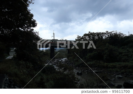 Uetsu Main Line over the Naso River [Nikaho City, Akita Prefecture] 95611700