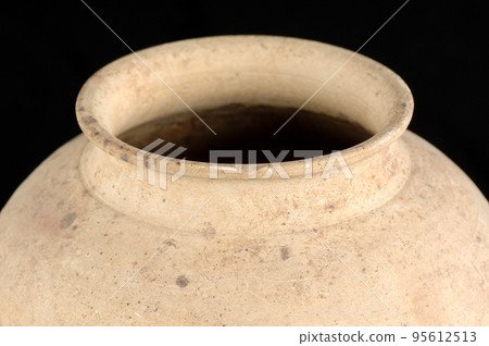 A clay vase isolated on a white background 95612513