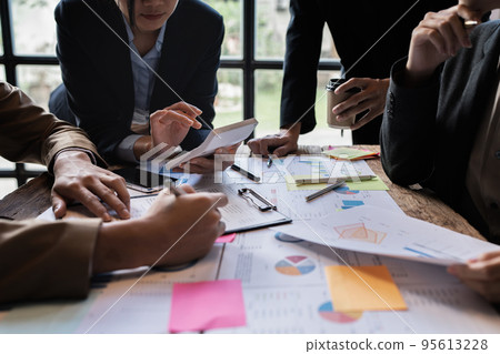 Fund managers team consultation and discuss about analysis Investment stock market by digital tablet Fund managers team consultation and discuss about analysis Investment stock market by digital tablet 95613228