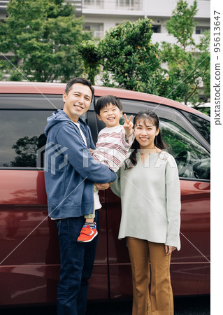 Family image driving with a boy 95613647
