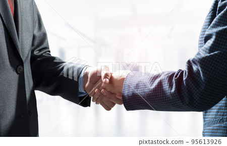 Close-up of the handshake of businessmen. 95613926