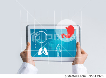 Close of female doctor hands working with tablet pc computer 95613928
