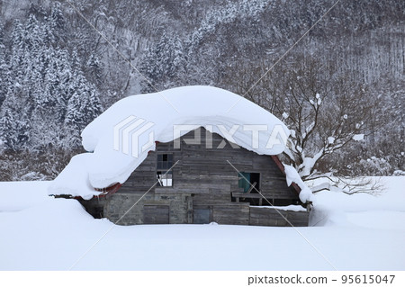 Hokkaido Soya region Old cow barn buried in snow 95615047