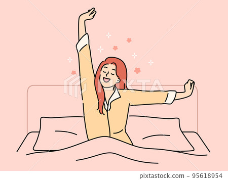 Happy woman stretch wakeup in bed 95618954