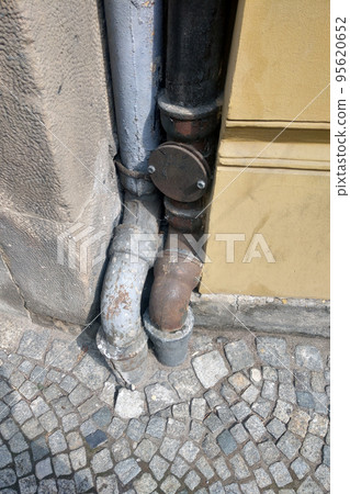 Old downspouts or sewers in the house. 95620652