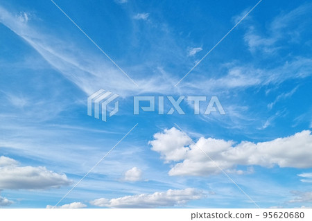 Beautiful blue sky with white clouds. The background of nature. Beautiful blue sky with white clouds. The background of nature. 95620680